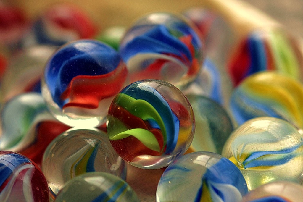 A stack of multicolored marbles 